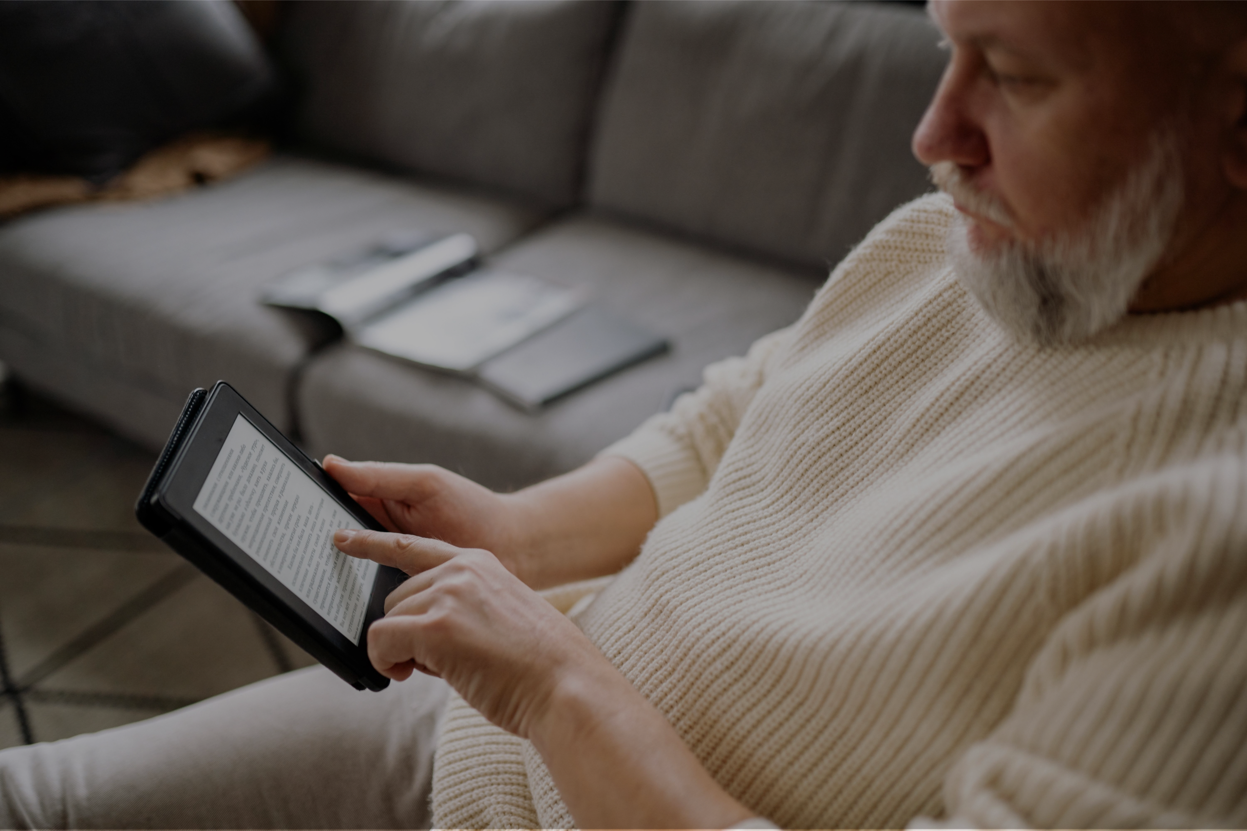 Man reading an e-book